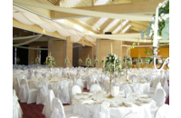 all white tables and decorations at wedding