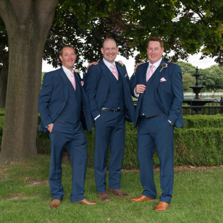 groomsmen posing outdoors