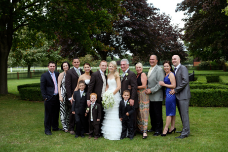 bride and groom with families